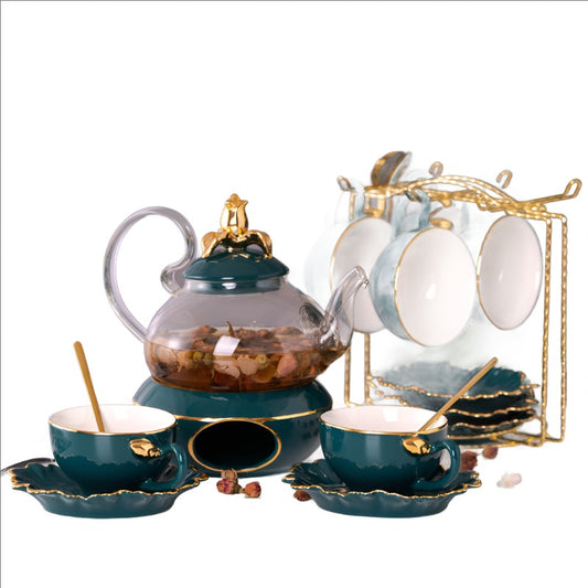 "Elegant Afternoon Tea: Glass Teapot and Ceramic Tea Cup Set with Metal Holder"